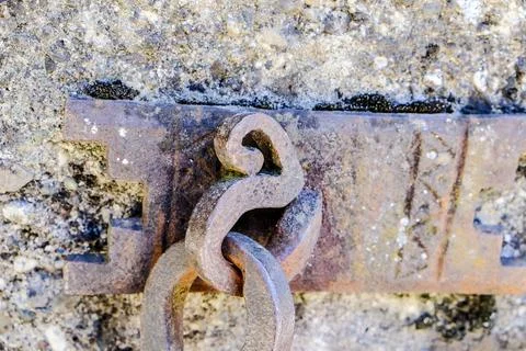 Old rusty hook fixed to a wall Stock Photos