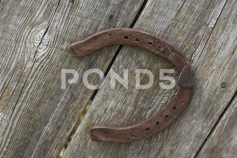 Old rusty horse shoe Stock Photos