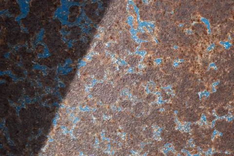 Old rusty iron and peeling, blue dried paint Stock Photos