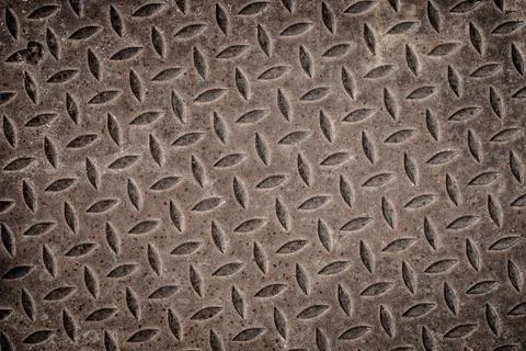 Old rusty iron drain grid. Stock Photos