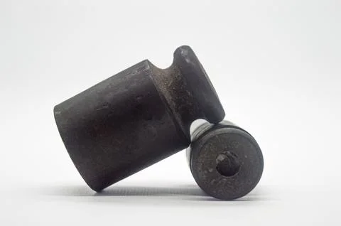 Old rusty iron scale weight isolated on white background. perfect for econo.. Stock Photos