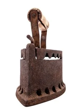 Old rusty iron on a white background. Ironing. Stock-Fotos