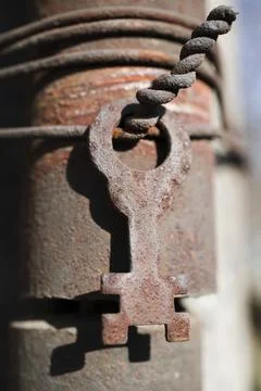 Old rusty key close up view Stock Photos
