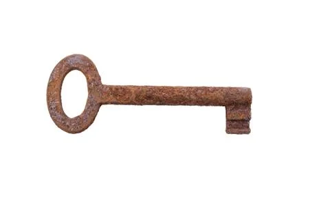 Old rusty key on a white background Foto stock