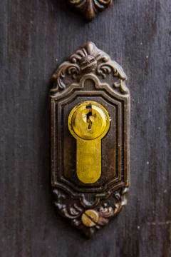 Old rusty keyhole, part of ancient door Stock Photos