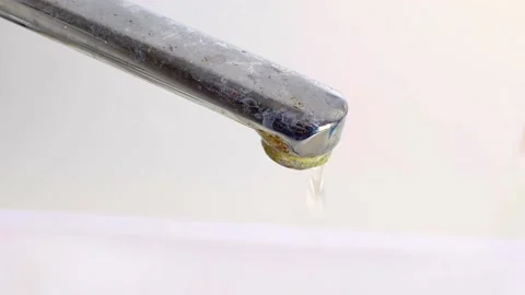 Old rusty leaky tap with limescale, drops running falling down, plumbing leak. Stock Footage 188047515