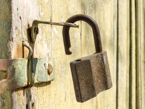 Old rusty lock on the door Stock Photos