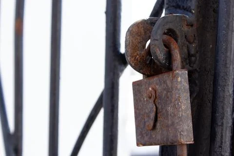 Old rusty lock on a metal gate Stock Photos