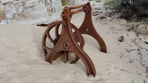 Old rusty machinery on the beach Stock Footage 142965526