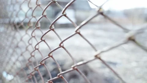 Old rusty mesh fence close up on the street Stock Footage 194015695