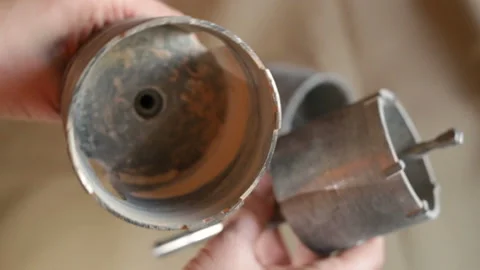 Old rusty metal crowns for electrical work. Contains people, close-UPS, real tim Stock Footage 128828963