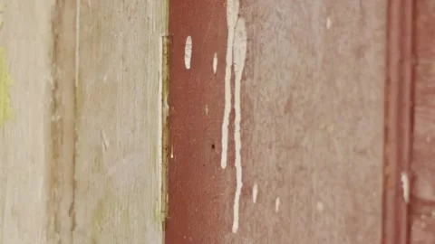 Old rusty metal door hinge on a brown wooden frame being moved slowly while.. Stock Footage 324821385