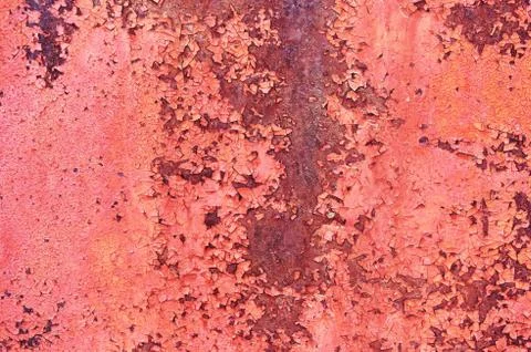 Old rusty metal sheet colored red paint cracked. Abstract background. Metall Stock Photos