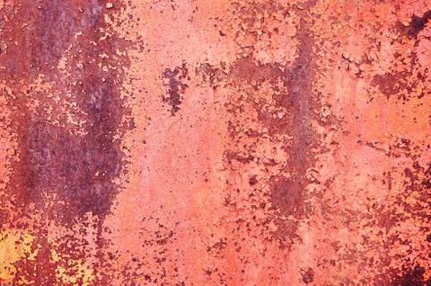 Old rusty metal sheet colored red paint cracked. Abstract background. Metall Stock Photos