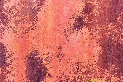 Old rusty metal sheet colored red paint cracked. Abstract background. Metall Stock Photos