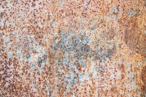 Old rusty metal texture on the surface of an iron sheet with pitting Stock Photos
