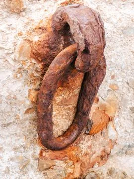 Old rusty mooring ring on an old concrete pier Stock Photos