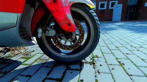 Old Rusty Motorcycle in the City Stock Footage 115659165