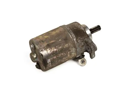 Old rusty motorcycle starter motor Stock Photos