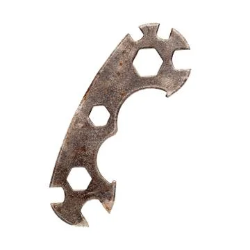 Old rusty multi function bicycle wrench hexagon. Stock Photos