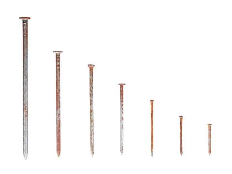 Old rusty nails of different lengths isolated on white Stock Photos