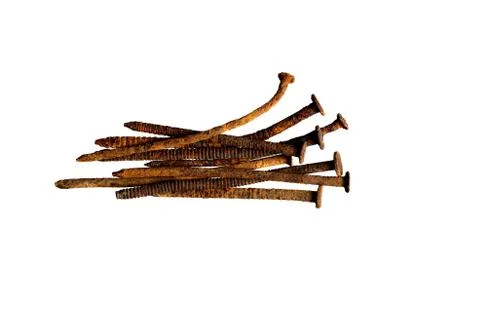 Old rusty nails on white isolate 库存照片