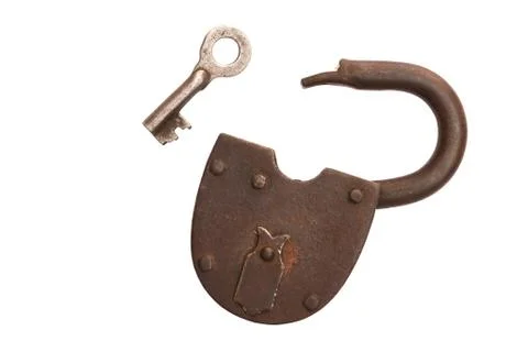 Old rusty padlock isolated on white background, key isolated. Stock Photos
