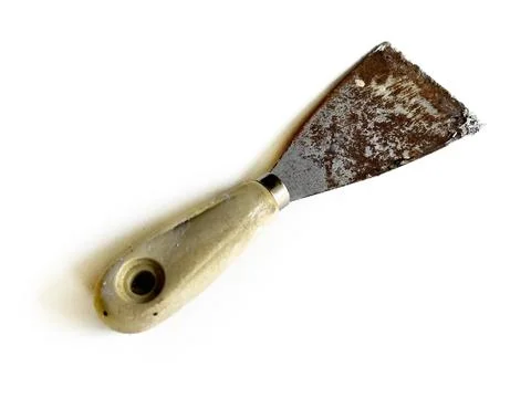An old rusty paint scraper putty knife Stock Photos