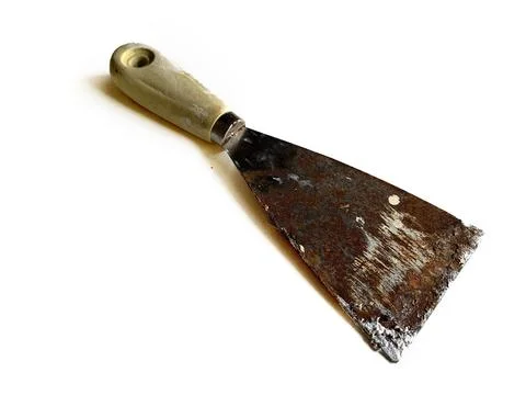An old rusty paint scraper putty knife Stock Photos