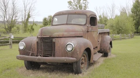 Old Rusty Pick Up Truck in a Field Cloudy Day wind Stock Footage 219225068
