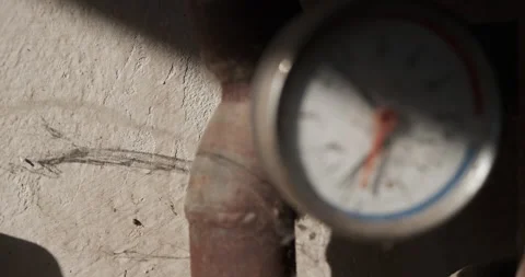 Old rusty pipe with an analog meter gauge Stock Footage 165508197