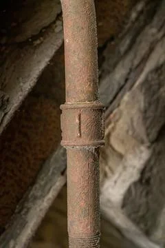Old rusty pipe which is abandoned, close-up. Stock Photos