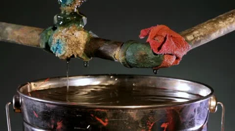 Old, rusty pipes leaking into bucket 스톡 동영상 20695119