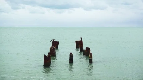 Old rusty pipes in the water Stock Footage 82170019