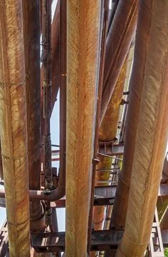 Old rusty piping system. Bottom view Stock Photos