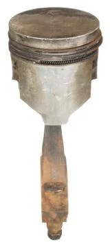 The old rusty piston with a rod isolated on a white background Stock Photos