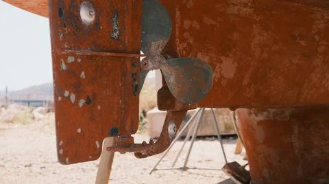Old rusty propeller screw of sailing yacht before repair Stock Photos