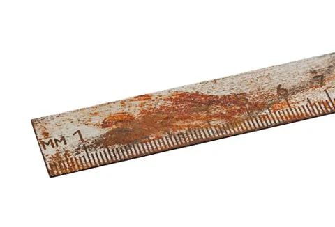 Old rusty ruler, isolated on a white background Stock Photos