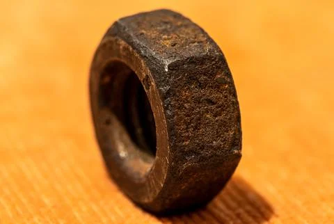 Old rusty screw nut macro close up shot Stock Photos