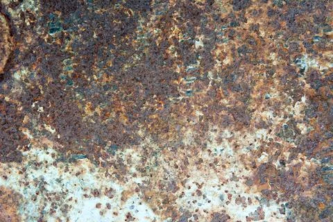 Old rusty sheet of iron background. Steampunk style is a template for design. Stock Photos