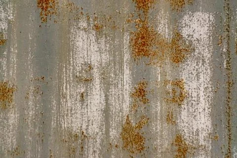 Old rusty sheet of iron painted with gray paint background texture backdrop Stock Photos
