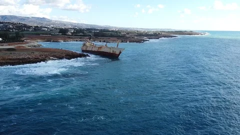 Old rusty ship thrown out on the bay, Cyprus a local non formal landmark Stock Footage 124651056