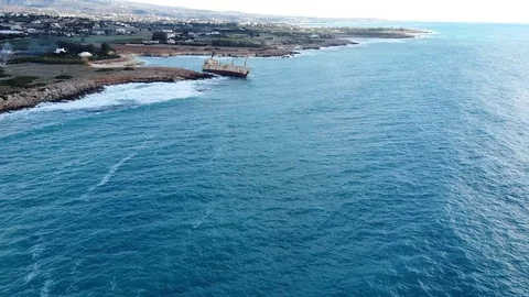 Old rusty ship thrown out on the bay, Cyprus a local non formal landmark Stock Footage 124651120