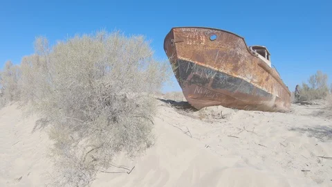 Old rusty ships in the place where the Aral Sea used to be Video stock 128734038