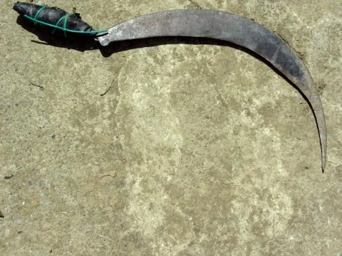 Old rusty sickle Stock Photos