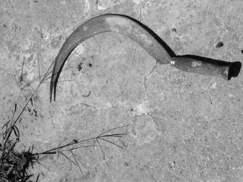 Old rusty sickle Stock Photos