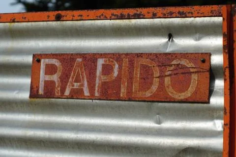 Old rusty sign on an old machine Stock Photos