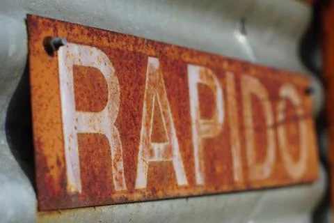 Old rusty sign on an old machine Stock Photos