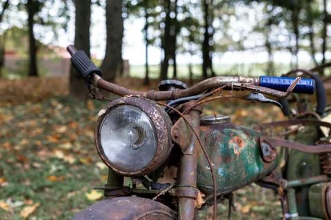 Old, rusty Soviet motorcycle Stock Photos
