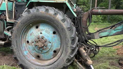 Old rusty Soviet Tractor in the field Stock Footage 239561552